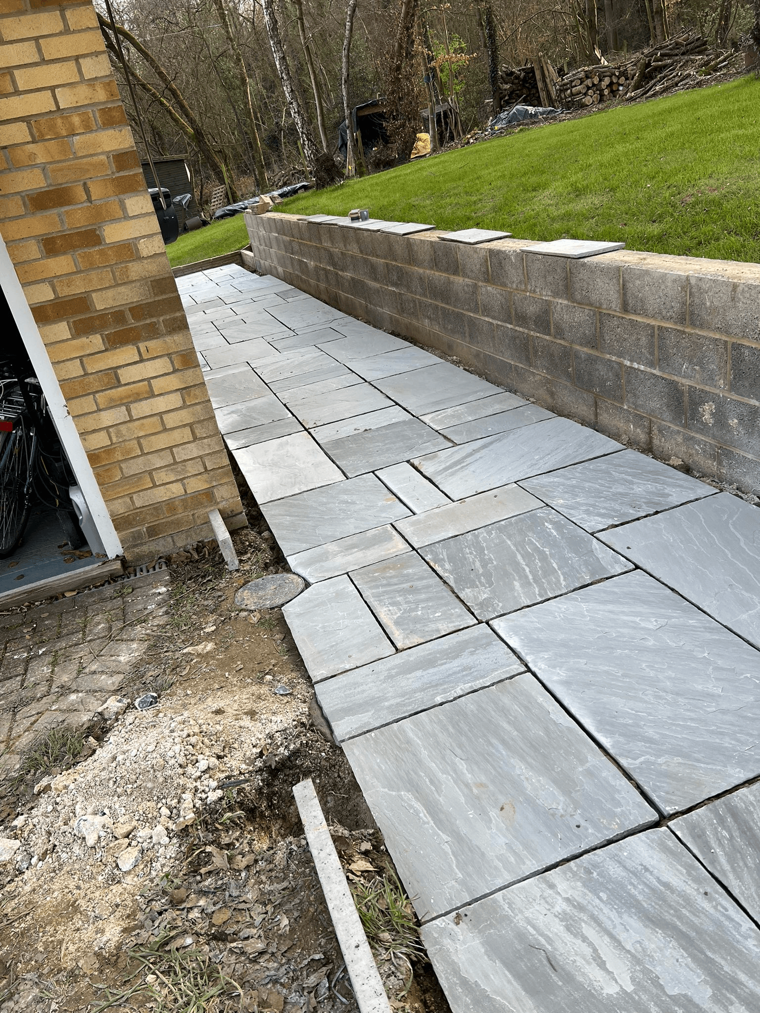 Natural stone pathway and garden wall